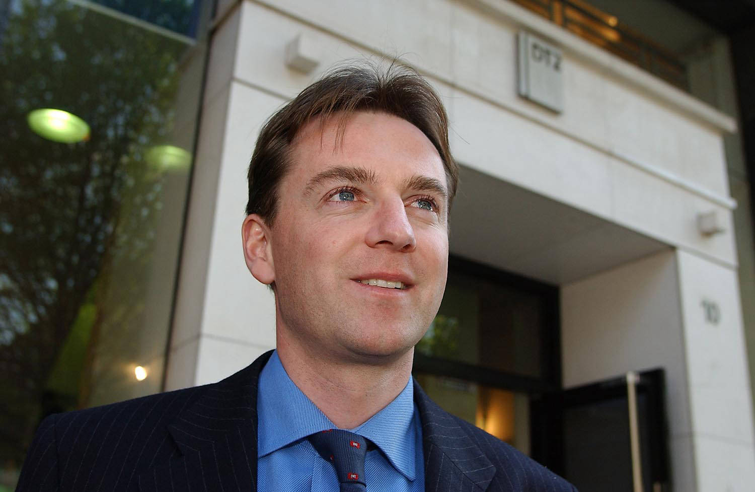 headshot profile taken for press release by photographer mike kelly 