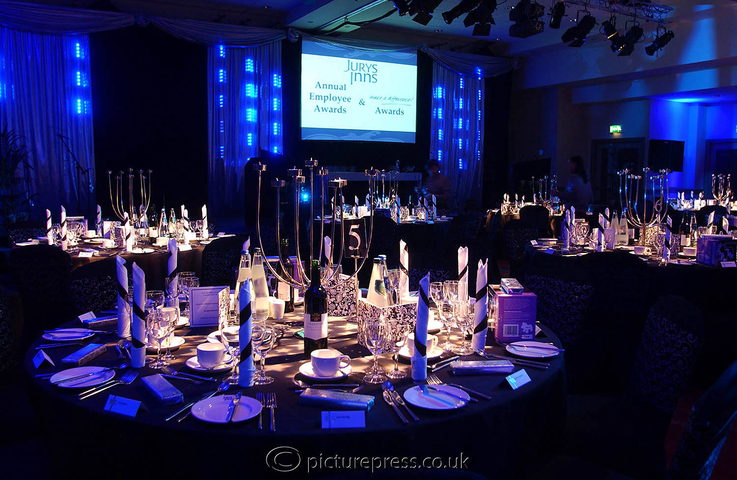 jurys employee event dinner tables.