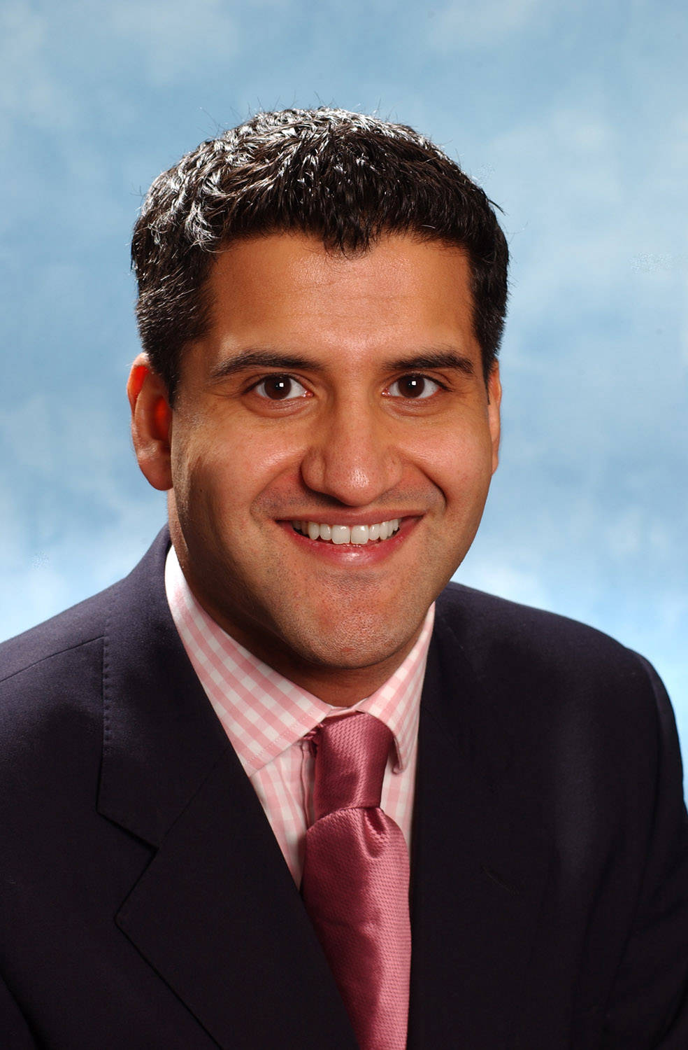 studio shot of corporate executive taken for press release .