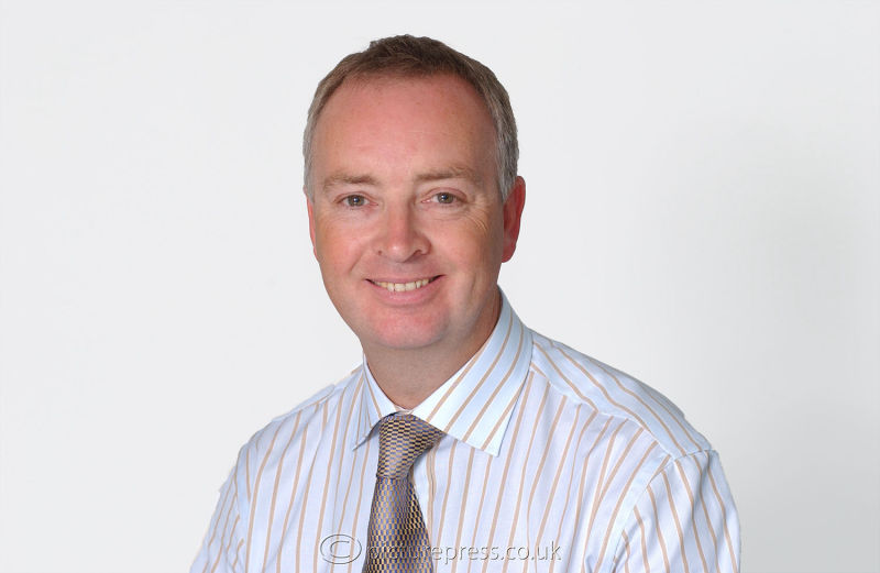 senior male executive office portrait, taken for web site by photographer mike kelly picturepress.