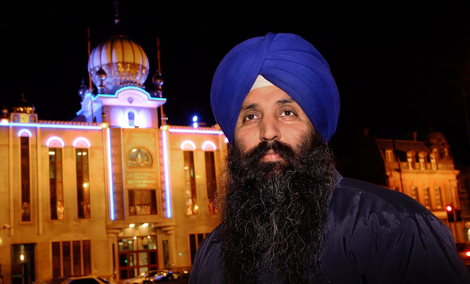 portrait of sikh man outside Guru Nanak Gurdwara temple in smetwick. photo taken for brochure 