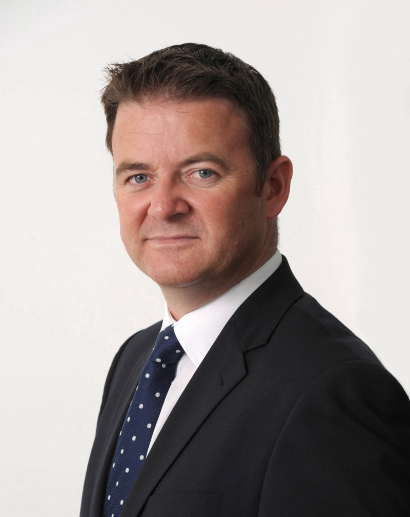 studio portrait of corporate executive