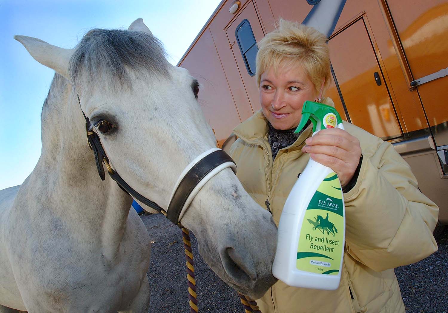 lady with horse image taken for news release for fly away insect repellant. by picturepress  photography